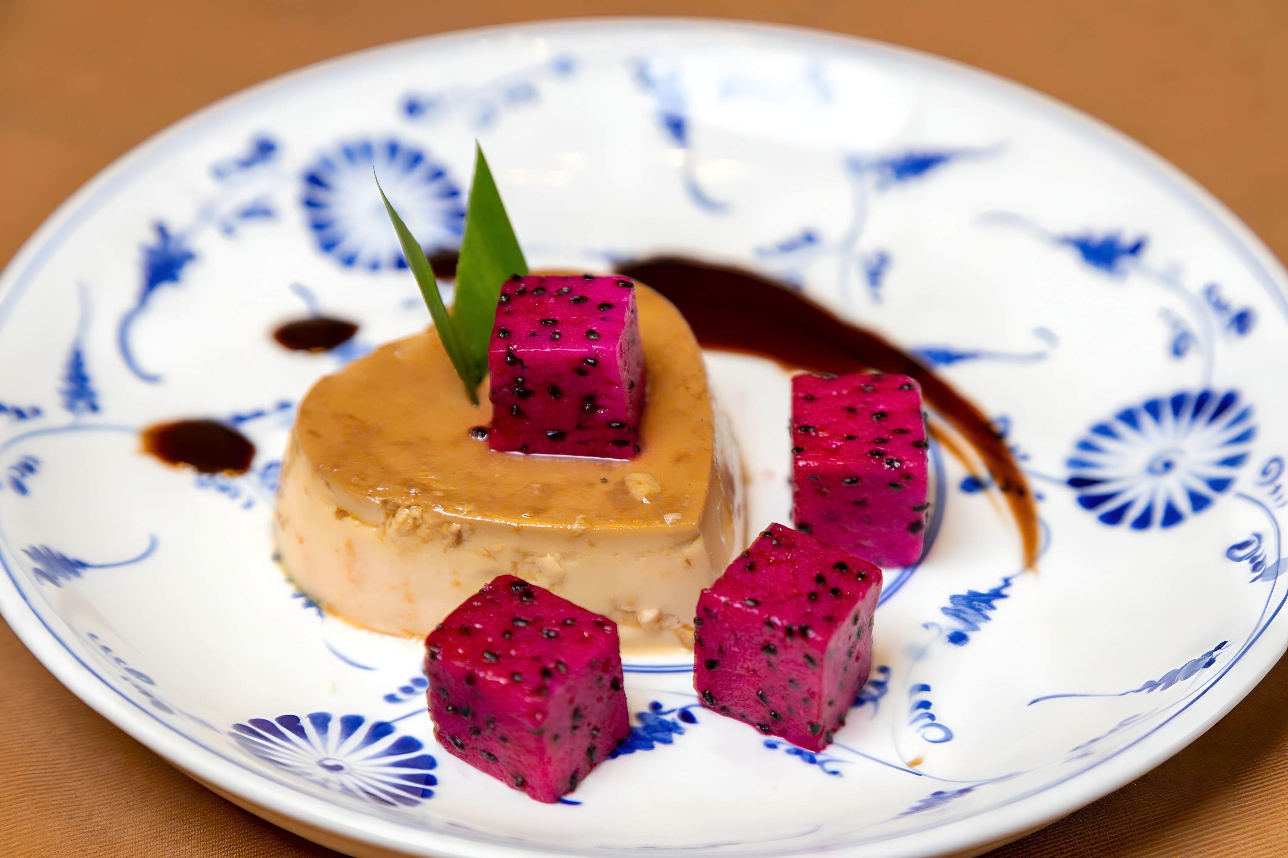 Creme caramel dessert with dragon fruit Emperor Cruise dinner